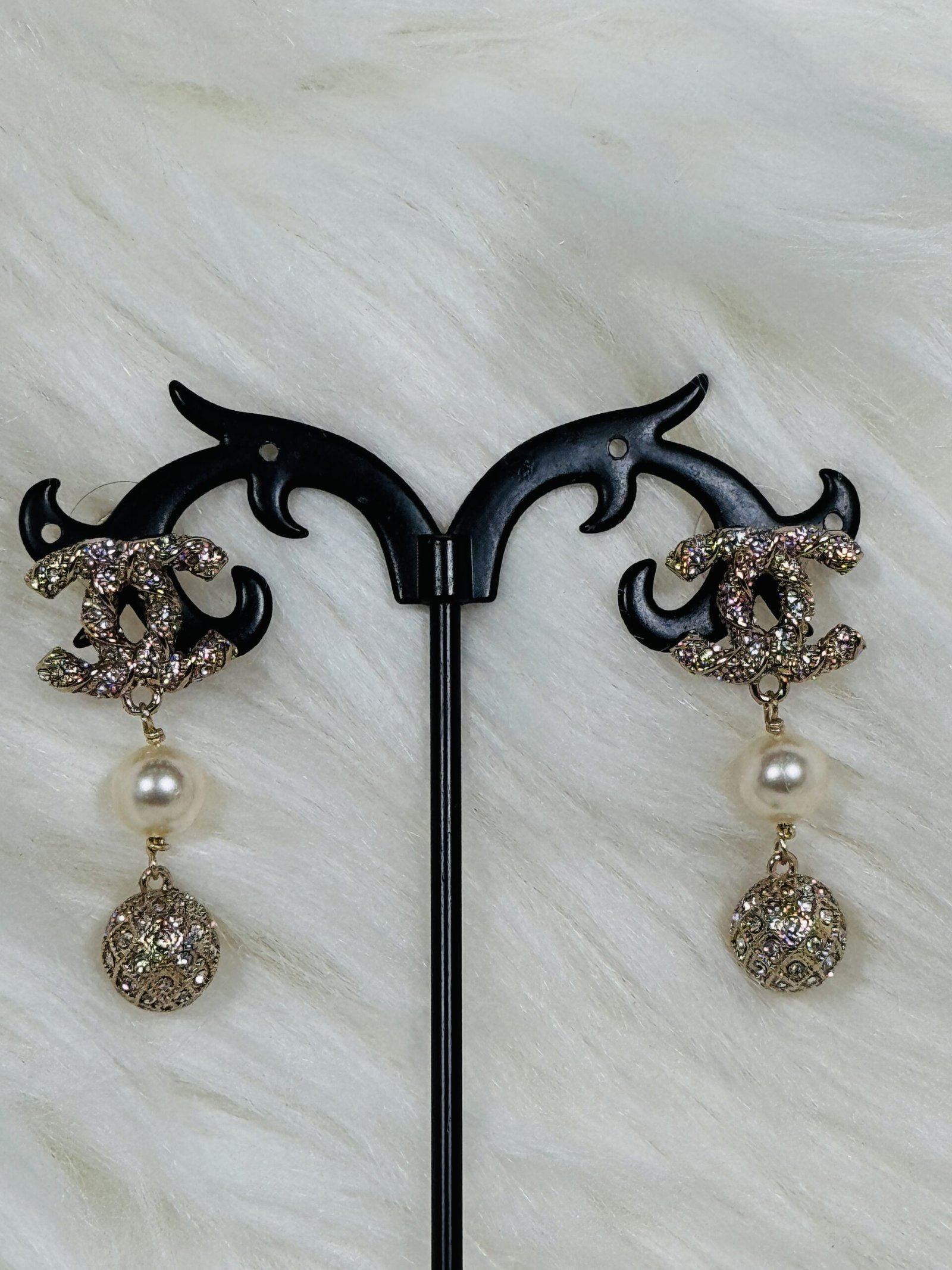 Elegant Channels Embellish Earrings with droppings of pearls and embellished stones