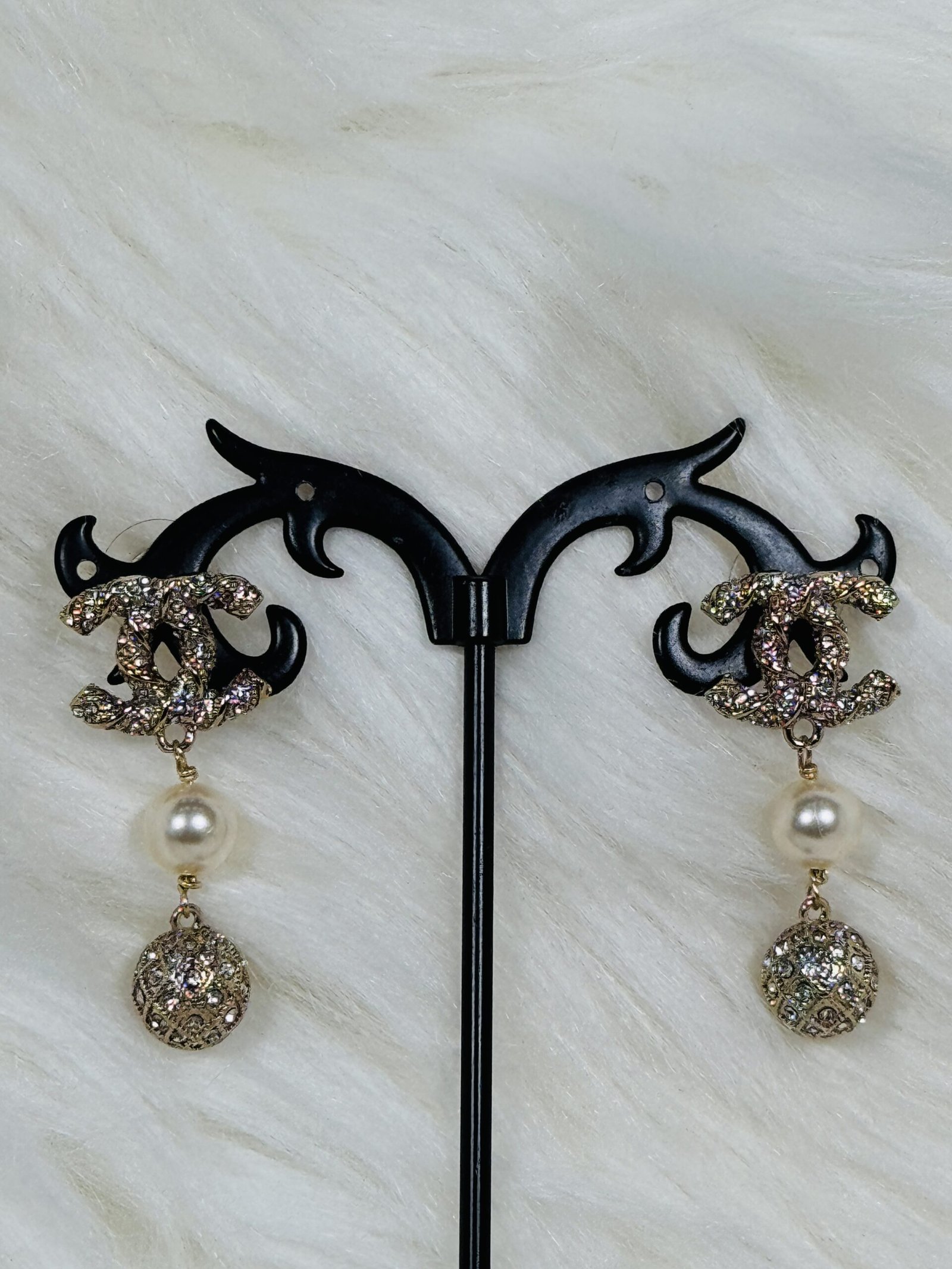 Elegant Channels Embellish Earrings with droppings of pearls and embellished stones