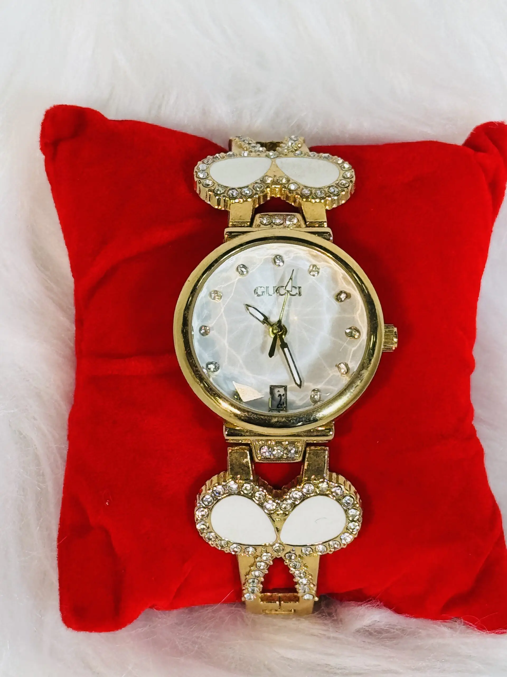 Gucci Wristwatch with White Strap & Golden Embellishment