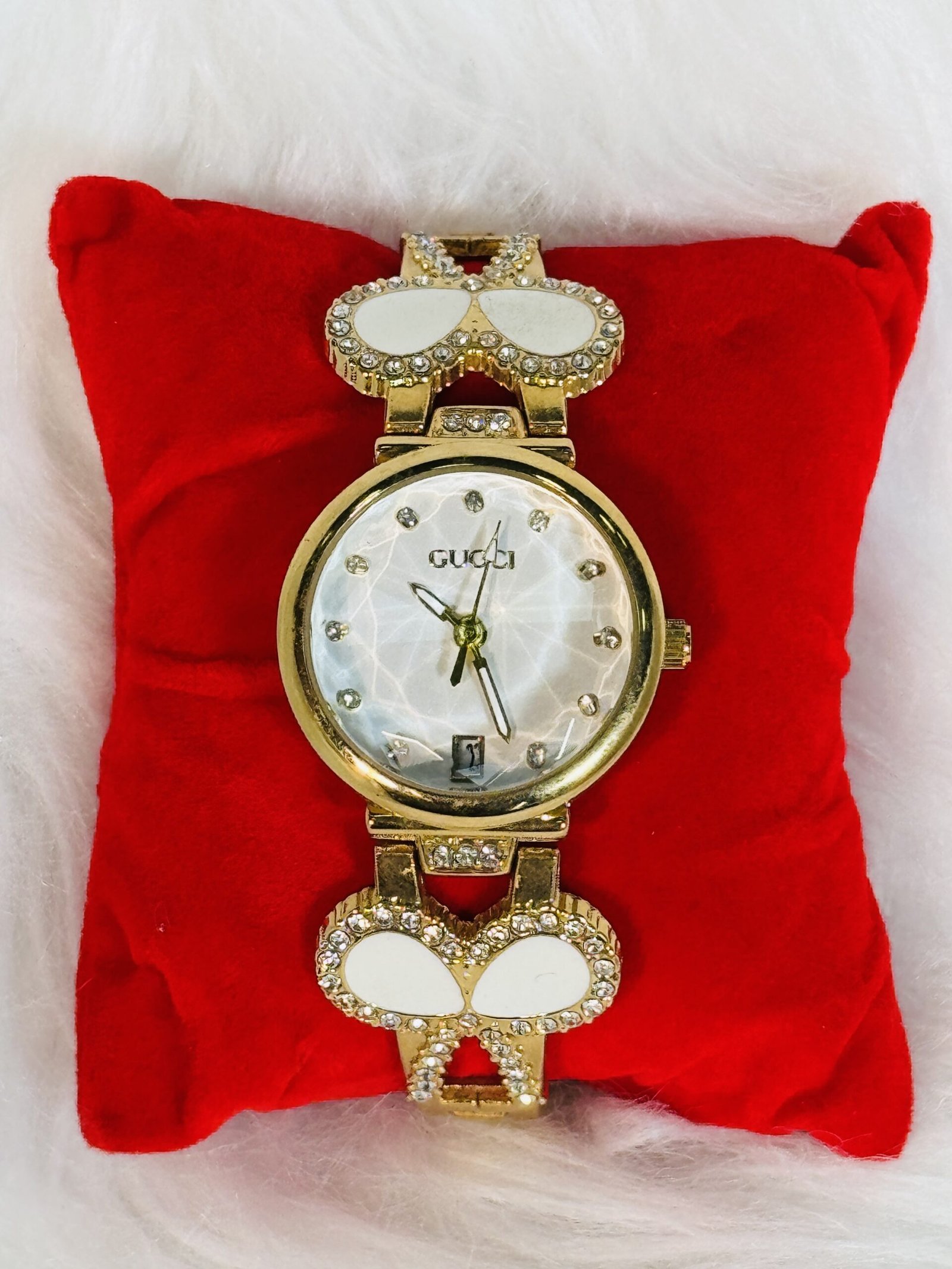 Gucci Wristwatch with White Strap & Golden Embellishment