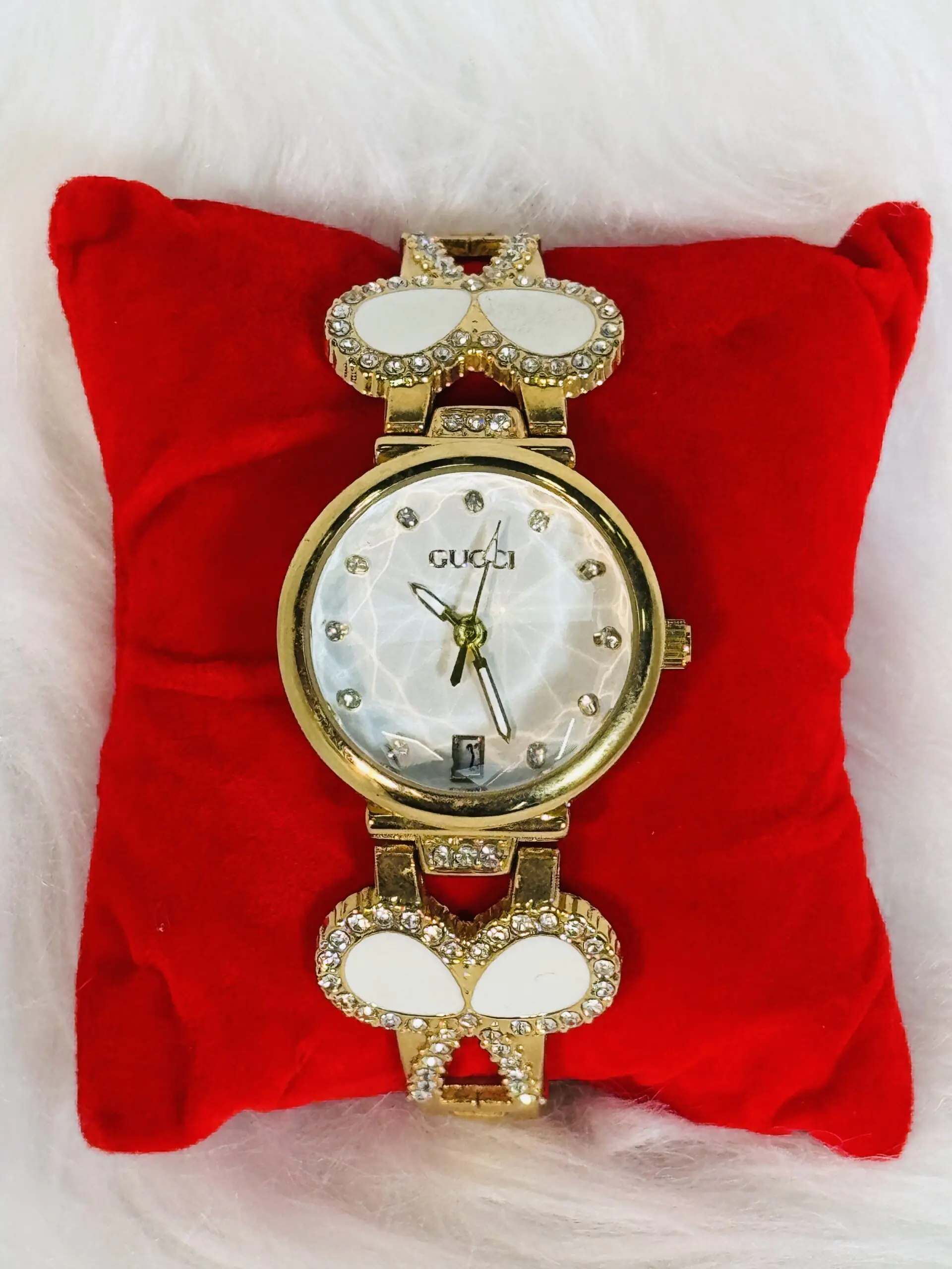 Gucci Wristwatch with White Strap & Golden Embellishment
