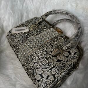 Strapped Silver Bag
